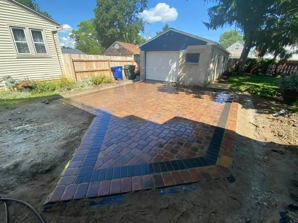 25 stone parking pad by Riepenhoff Landscape