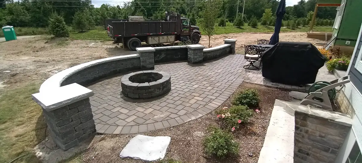 5 stone patio and fire pit by Riepenhoff Landscape